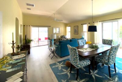 yellow walls and the sofa dividing the room, living room, Siesta model, Interior Design - by Ruth Dyer.