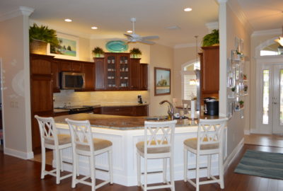Kitchen with Granite and matching Hardwood floors and Cabinets