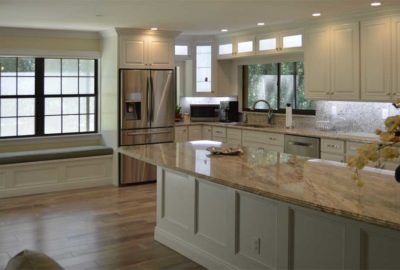 White Kitchen and Engineered Hardwood floor.