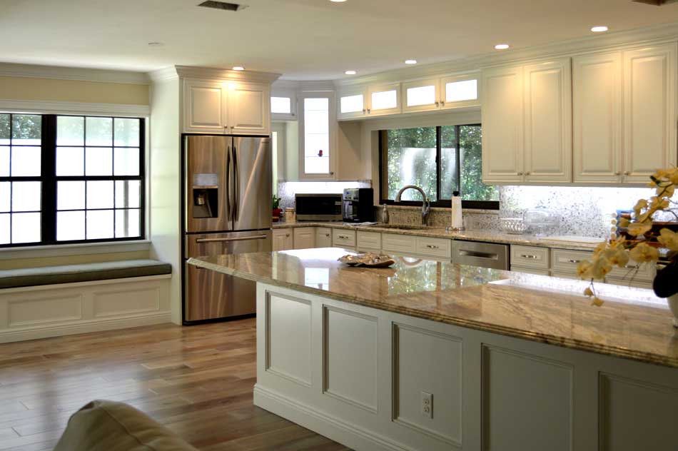 White Kitchen with Hardwood and Granite.