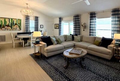 Curtains hung high, Bright art and Big rug, Interior Design - Home Décor by Ruth Dyer.