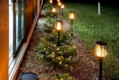 These are the torches at night. They flicker like a real flame. You cannot tell they are solar - Interior Design - Home Décor by Ruth Dyer.