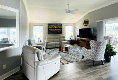 After, open living room of the Begonia model - Home Décor by Ruth Dyer - in the Villages of Florida.