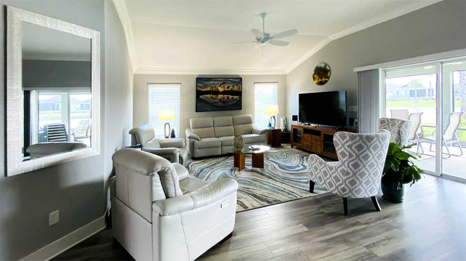 After, open living room of the Begonia model - Home Décor by Ruth Dyer - in the Villages of Florida.