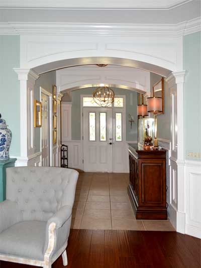 Foyer of Bridgeport Model, wrapped in molding - Foyers of Sanibel and Bridgeport models, - Interior Design - in the Villages of Florida.