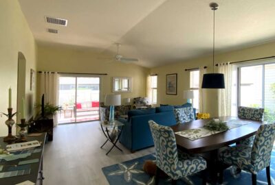 Before, a bit incomplete and window treatments too low, Siesta model, Home Décor by Ruth Dyer - in the Villages of Florida.