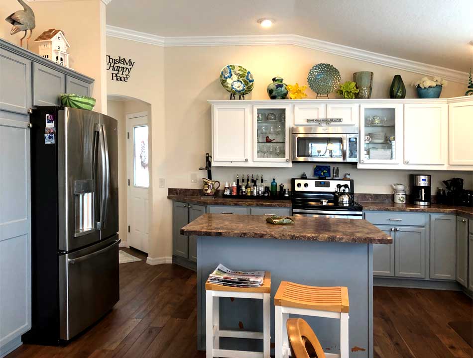 the kitchen and the refrigerator side, Belmont Cabana Villa, Interior Design - in the Villages of Florida.