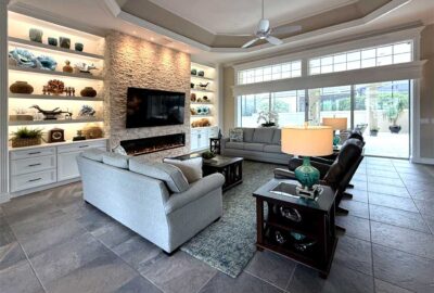 The room looks complete and so inviting, fireplace in a St. Charles model, Interior Design - by Ruth Dyer.