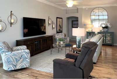 This shows the wall, Living room of a Monticello courtyard villa, Interior Design - in the Villages of Florida.