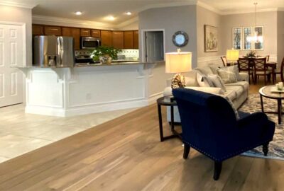 Large area where tile and hardwood meet without a lumpy threshold, Finishing Touch - by Ruth Dyer.