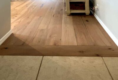 Tile abutting to engineered hardwood without a lumpy threshold, Interior Design - by Ruth Dyer.