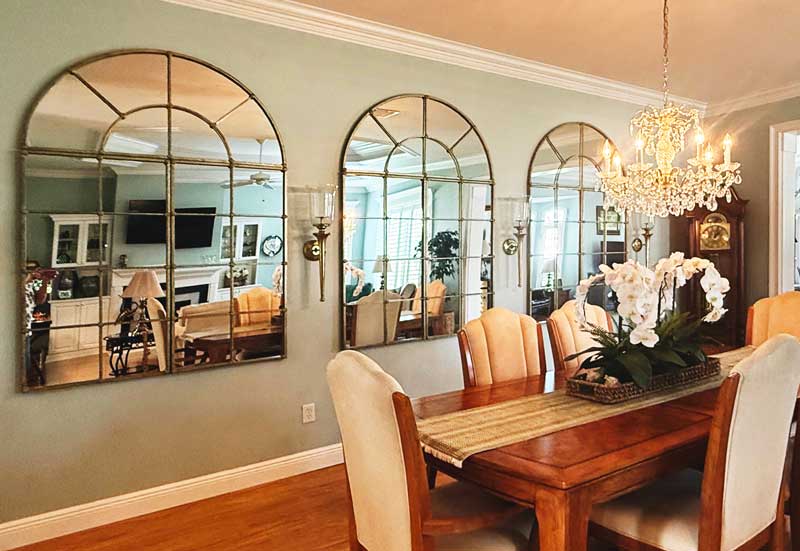 Large Mirrors reflecting light and providing architecture, Interior Design - by Ruth Dyer.
